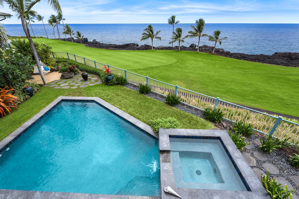 Oceanfront backyard with pool, spa, and uninterrupted views