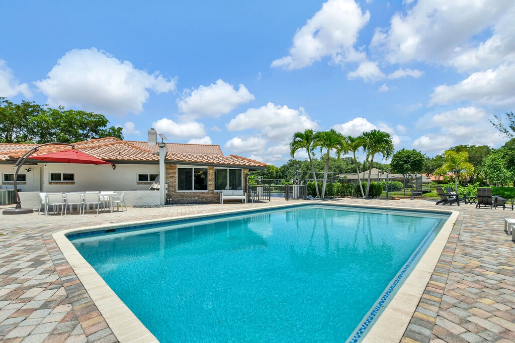 Oversized pool with child safety fence