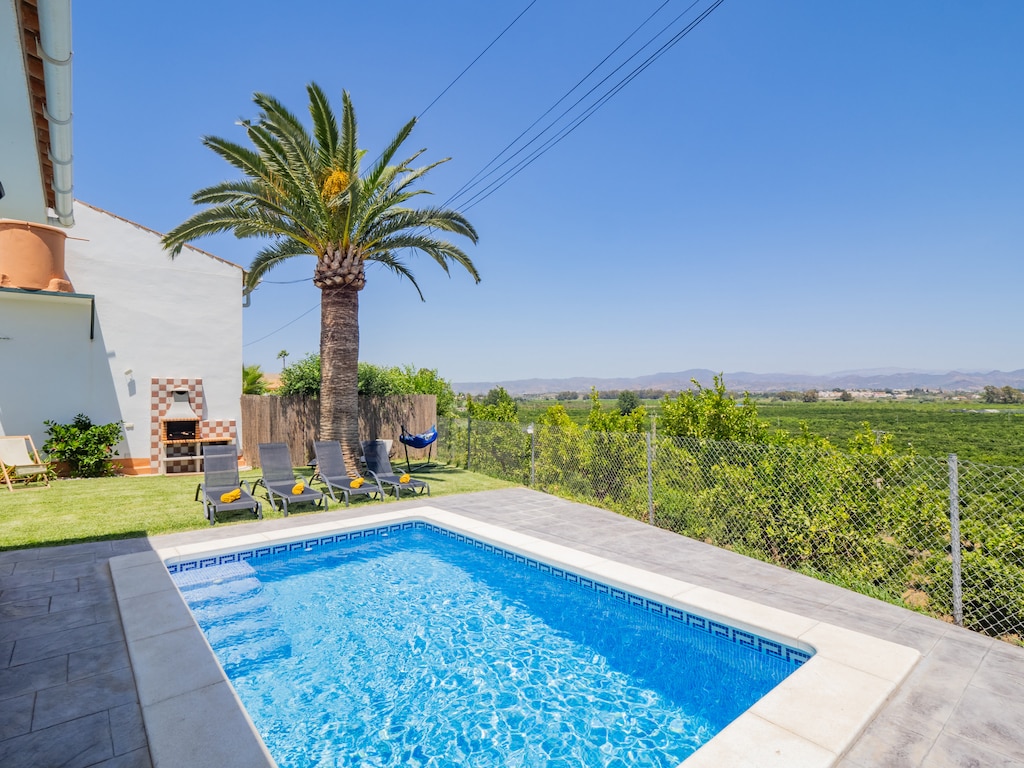 Swimming pool of the charming rural house situated in Alhaurín de la torre