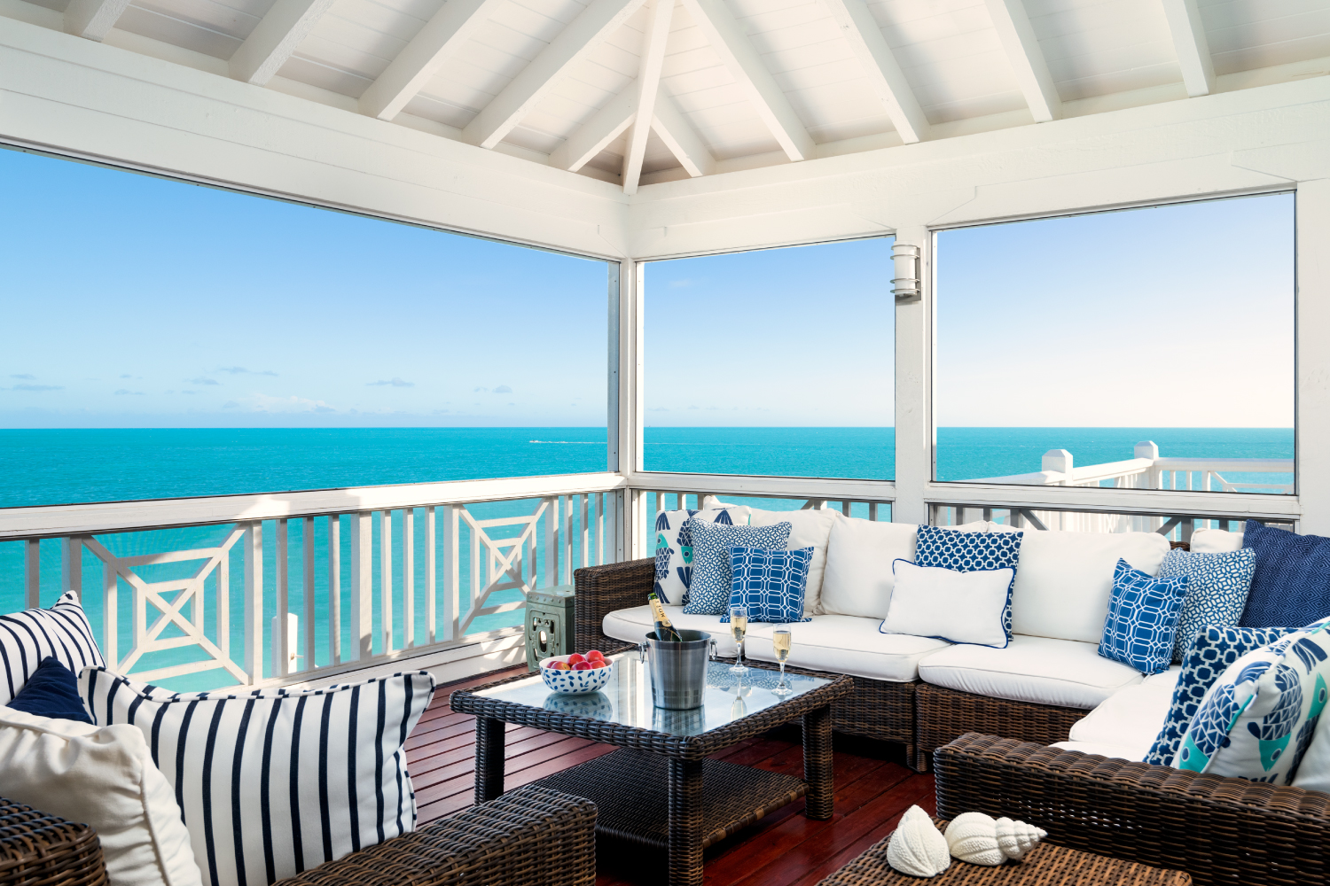 Enjoy a cup of coffee on the elevated screened in porch.