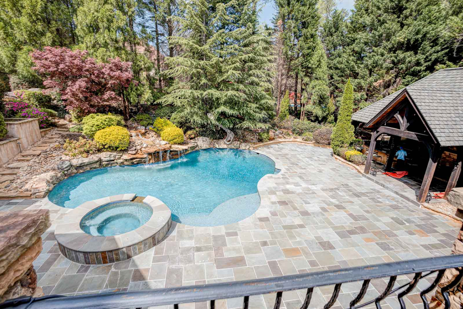 Complete with a private sparkling pool & hot tub.