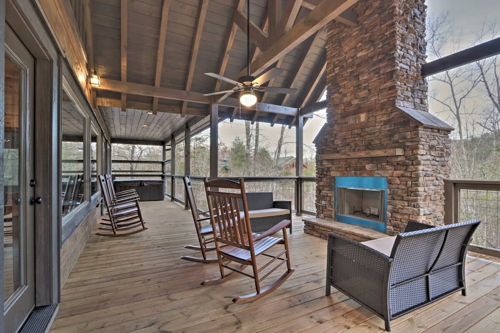 Rock the day away and enjoy time by the outdoor fireplace.