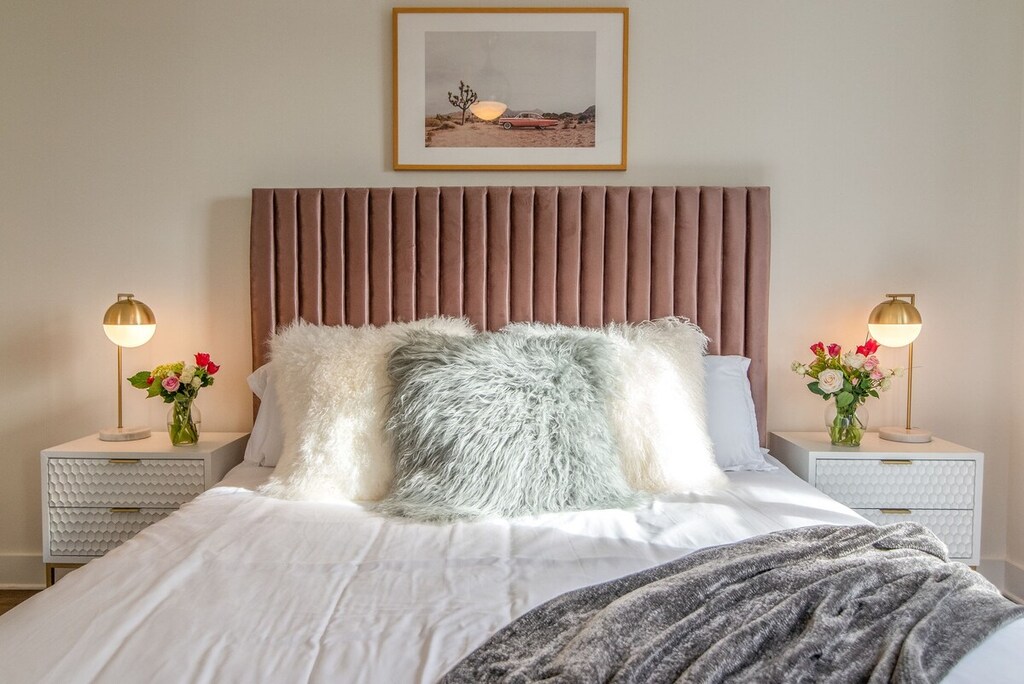 Unwind in the inviting embrace of crisp, cozy linens for a restful night’s sleep.