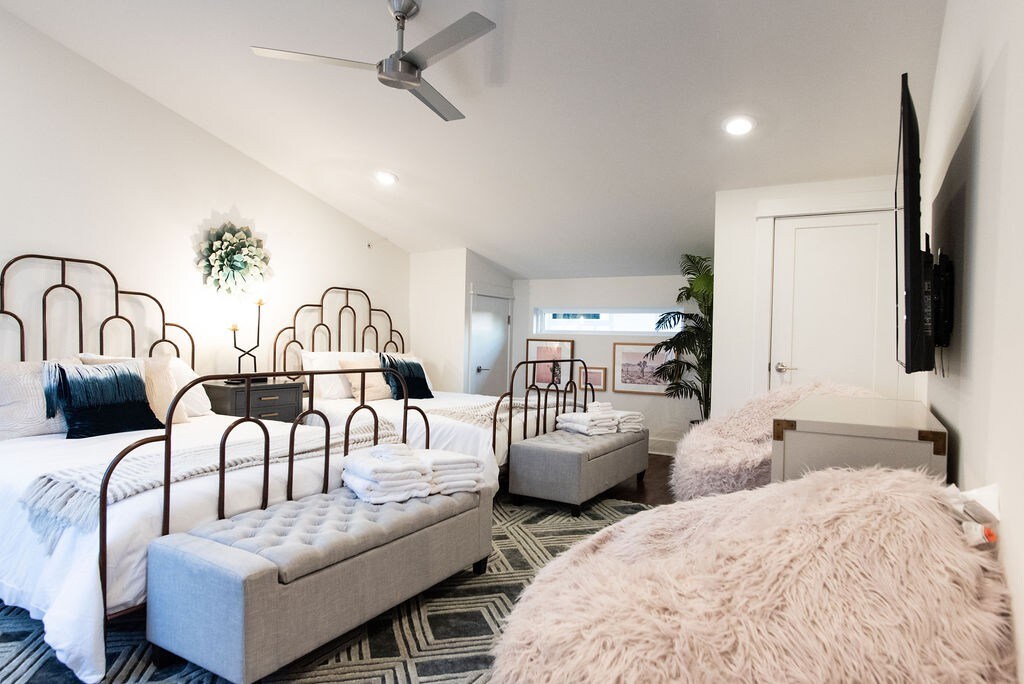 The top floor bed room provides exclusive rooftop access to the rooftop deck with panoramic views of Music City,