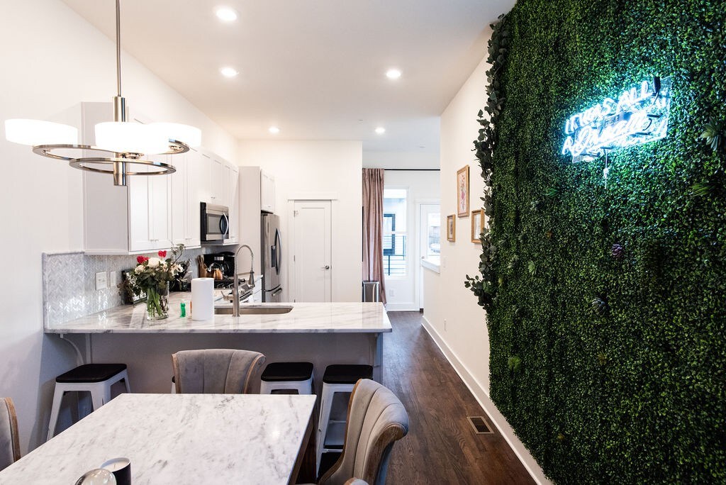 The open concept dining and kitchen area promotes lots of laughs together.