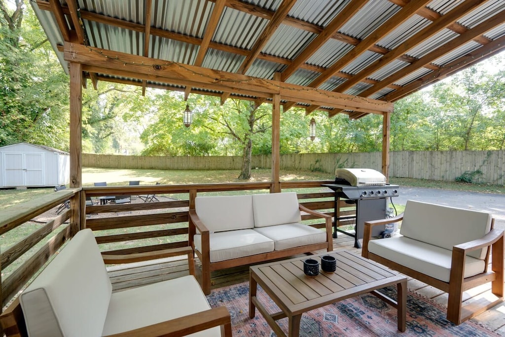 Get some fresh air under the shelter of this covered tin roof deck!