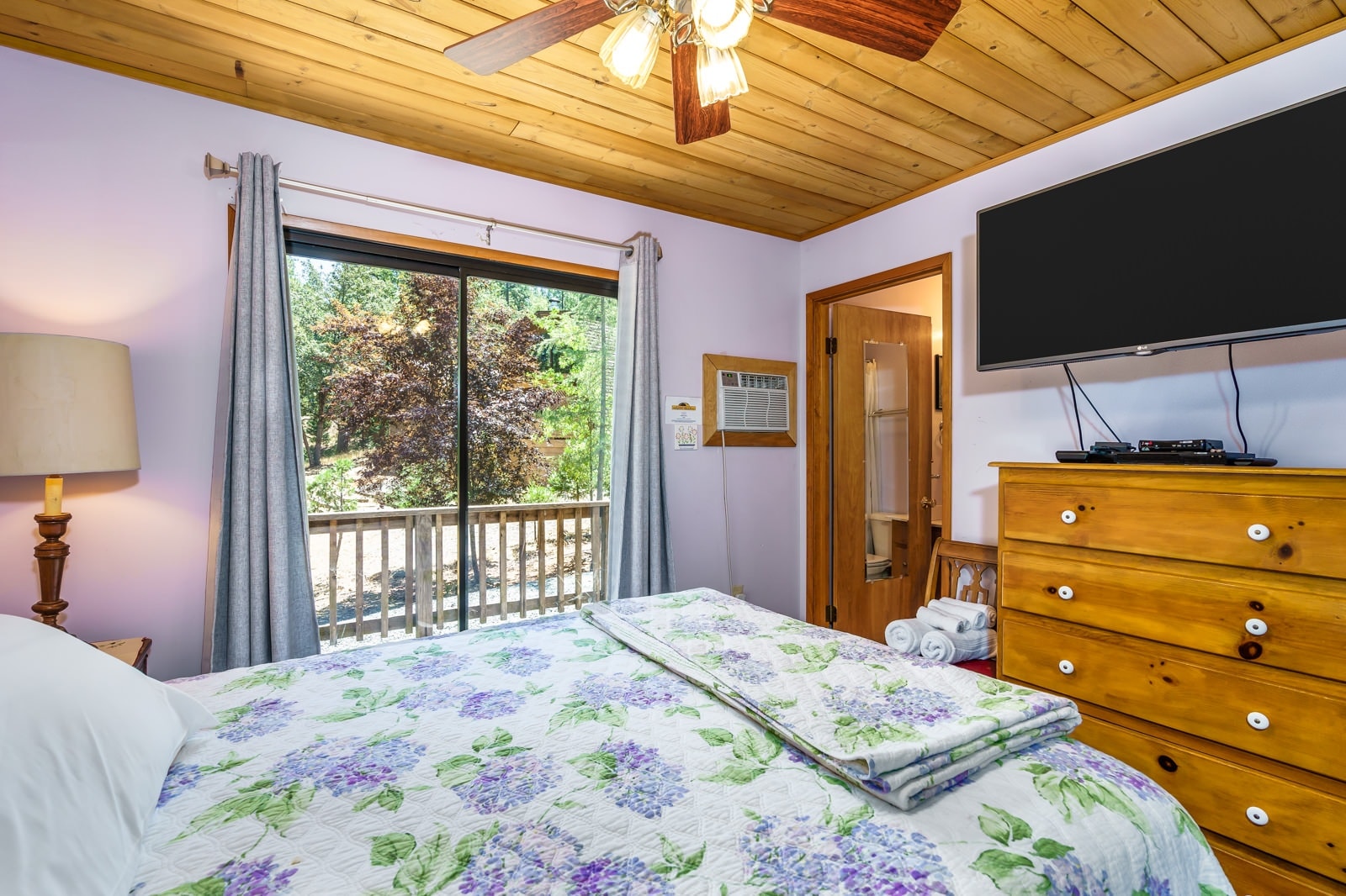 Main bedroom with flat screen tv. Unit 8 Lot 9, The Hideout, Pine Mountain Lake Vacation Rental.