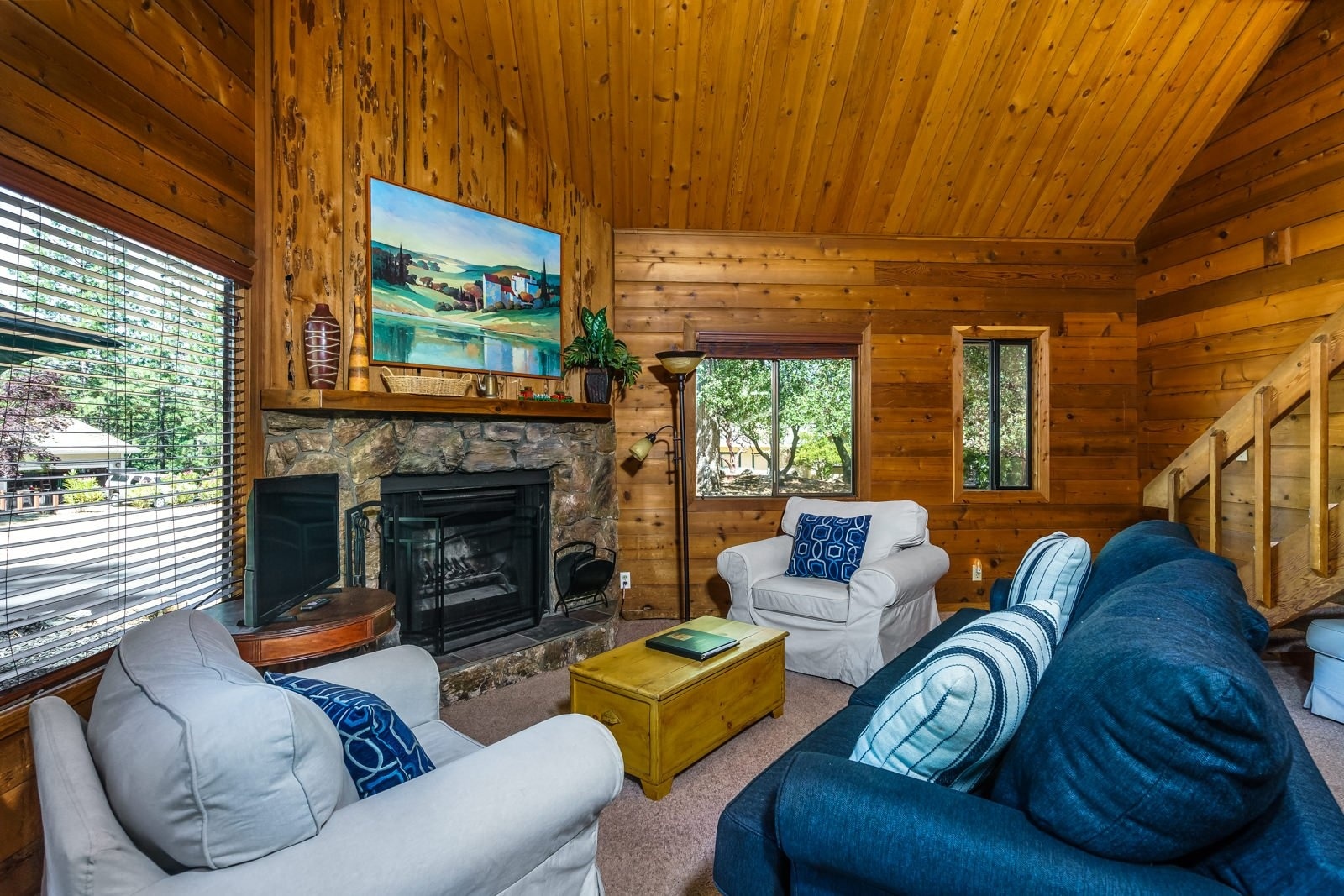 Rock fireplace in living room. Unit 2 Lot 157, Pine Mountain Lake Vacation Rental (Cabin De Alba).