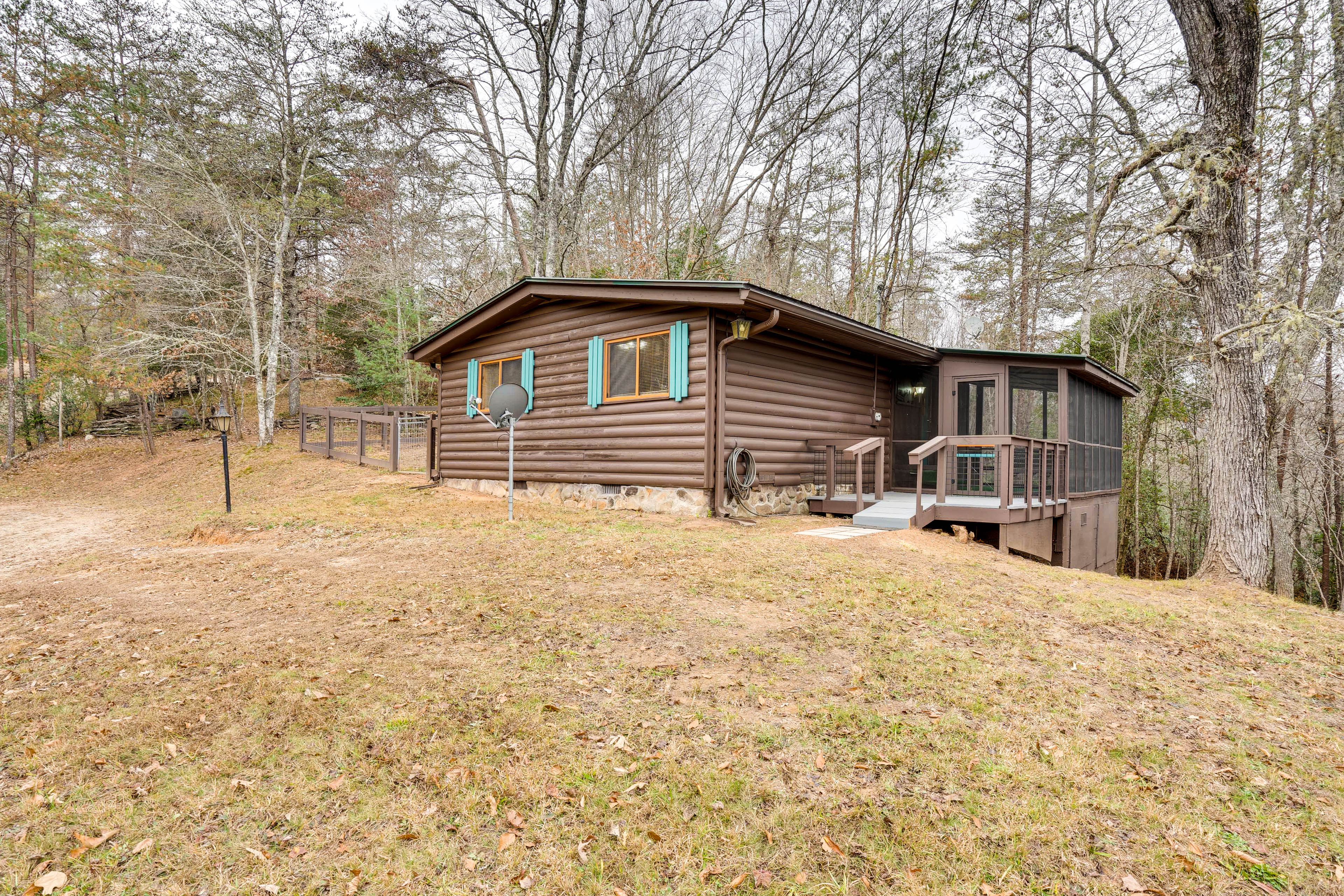 Property Image 1 - Peaceful Warne Cabin: Fenced Yard & Screened Porch