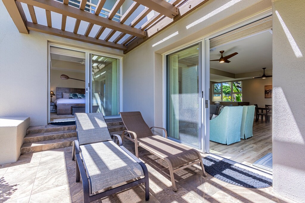 Relax on the lanai. Entry to primary bedroom