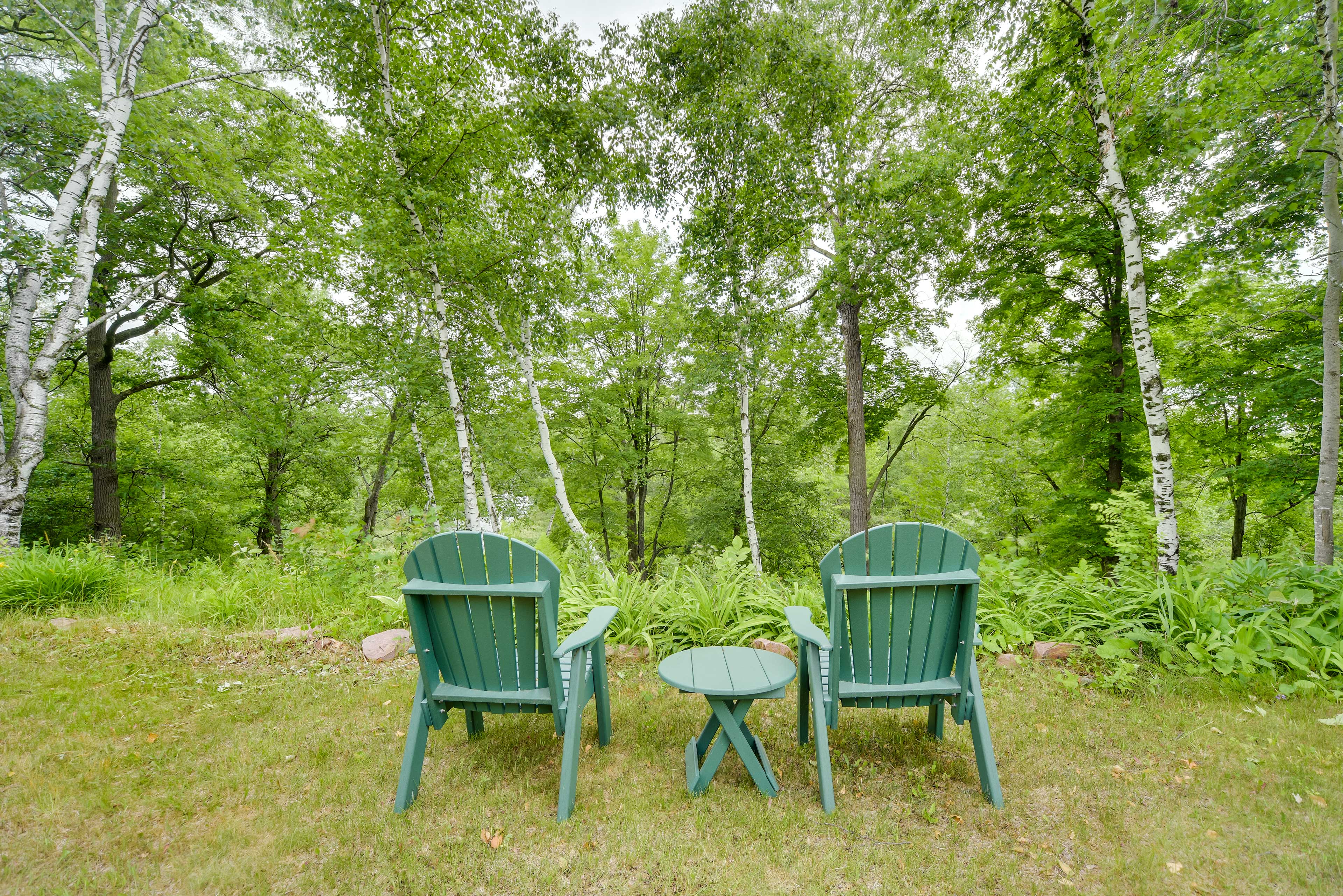 Property Image 1 - Riverfront Bliss in Rice Lake: Deck, Grill & Hike!