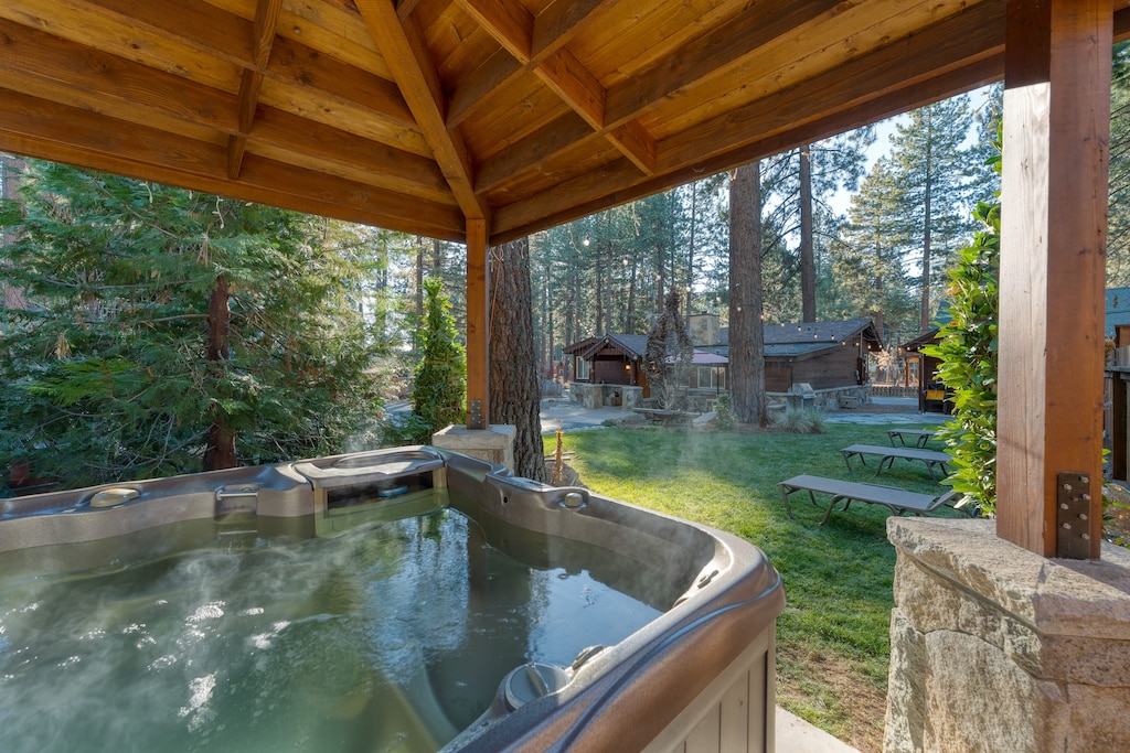 Private hot tub under a gazebo.
