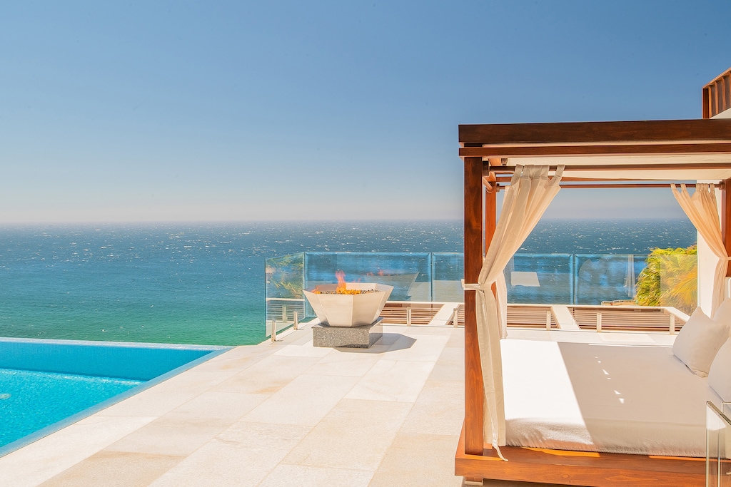 Patio with outdoor bed and ocean view -1