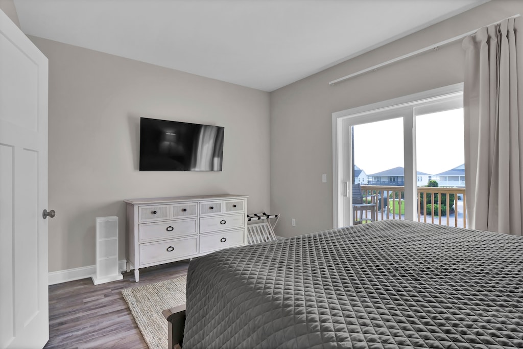 King bedroom , first floor sound side with deck access, TV & attached full bath