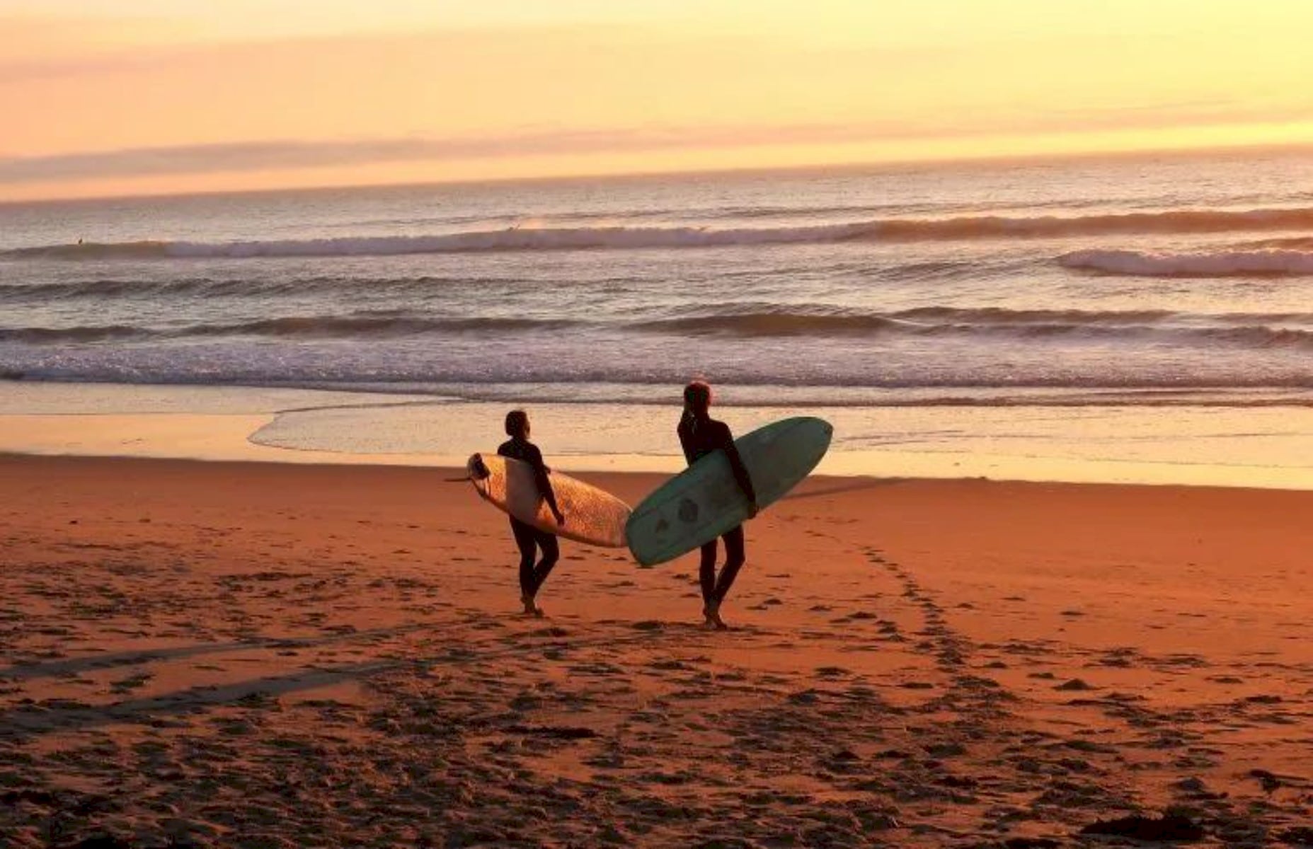 Sunset surfing hits different.