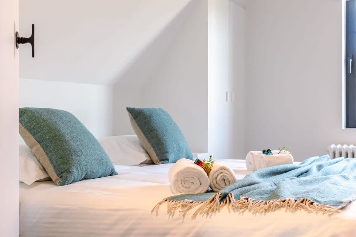 Calm bedroom with gentle colors and fresh linen