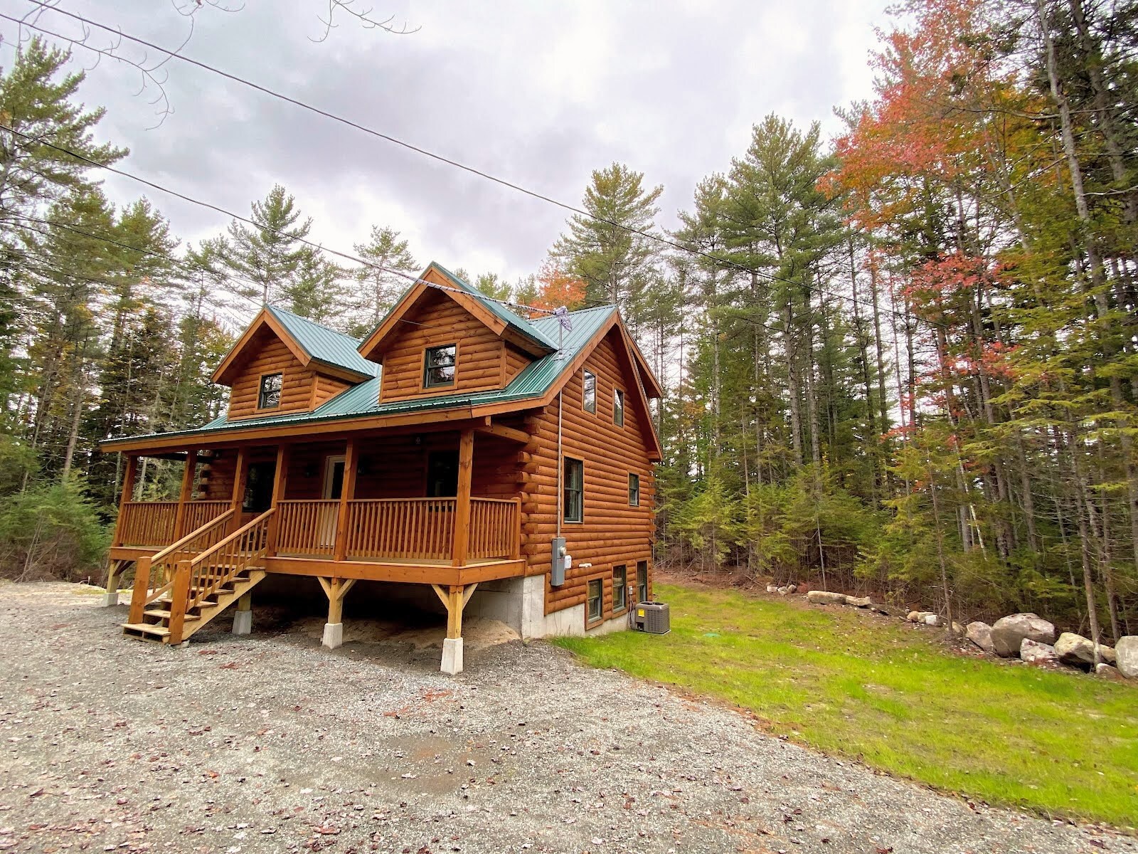 This beautiful log home, 80PVR, marries the classic coziness of log homes with modern comforts.