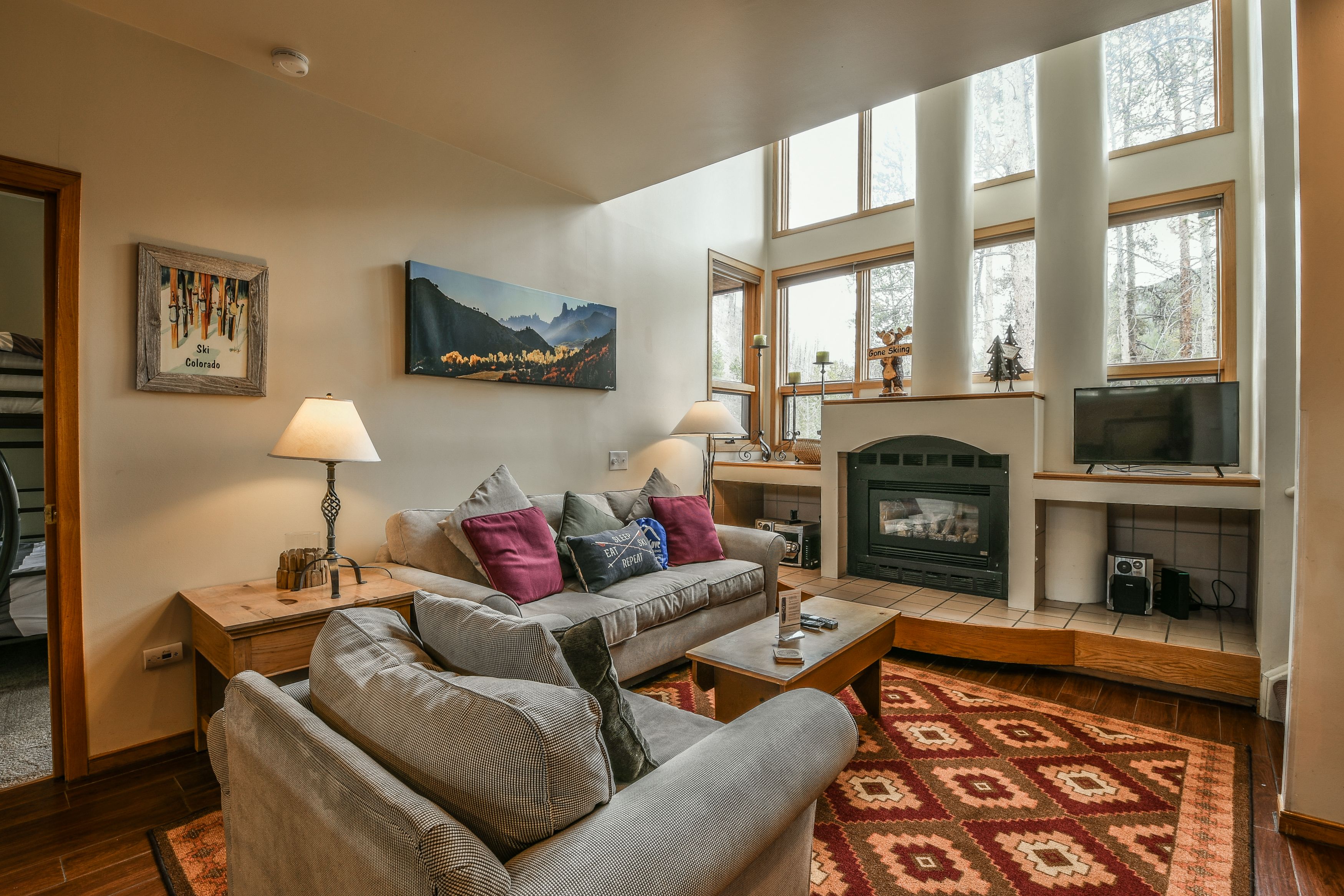 Cozy living room with colorful carpets