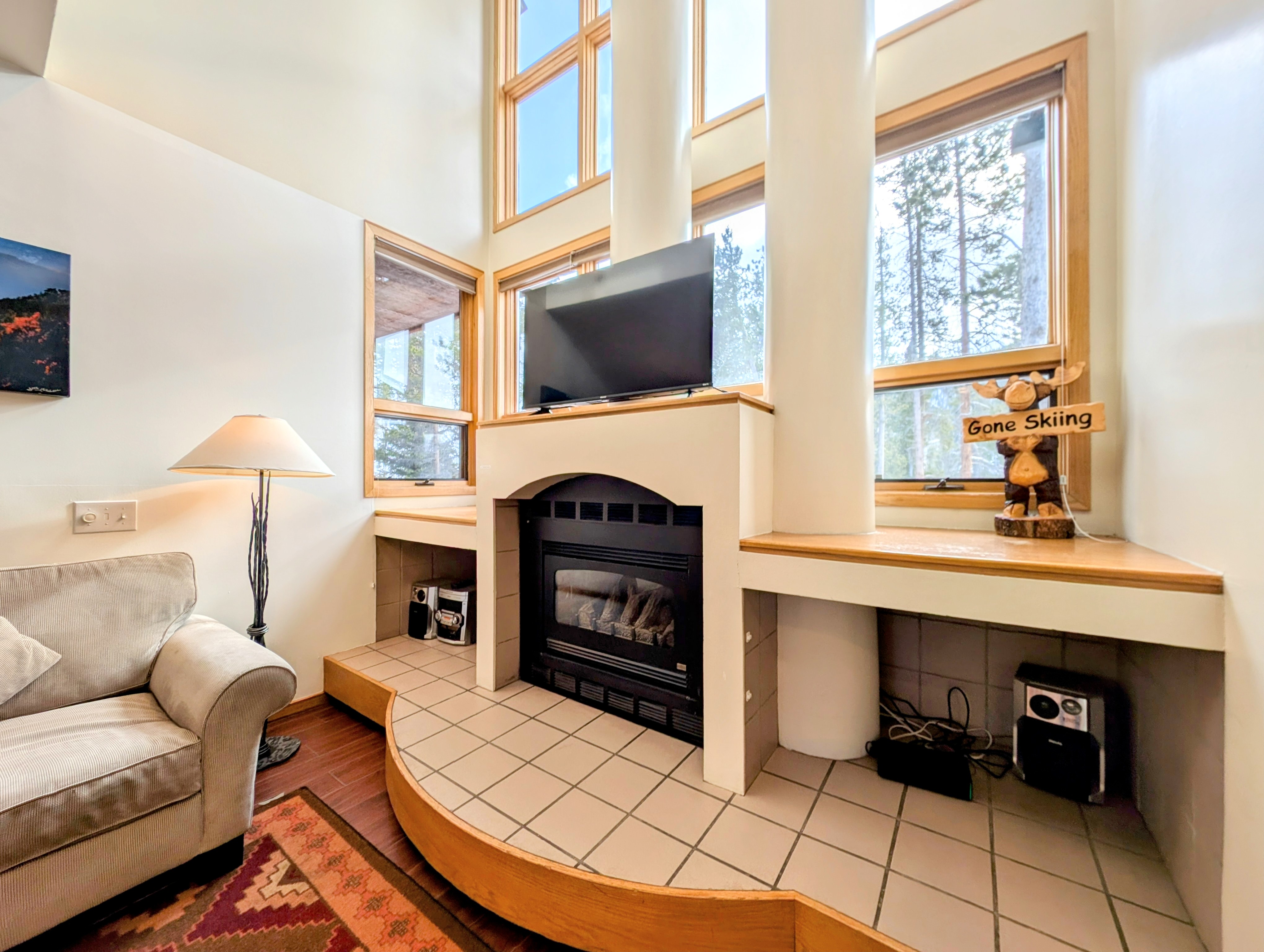 Fireplace with flat screen for relaxing after a day on the slopes