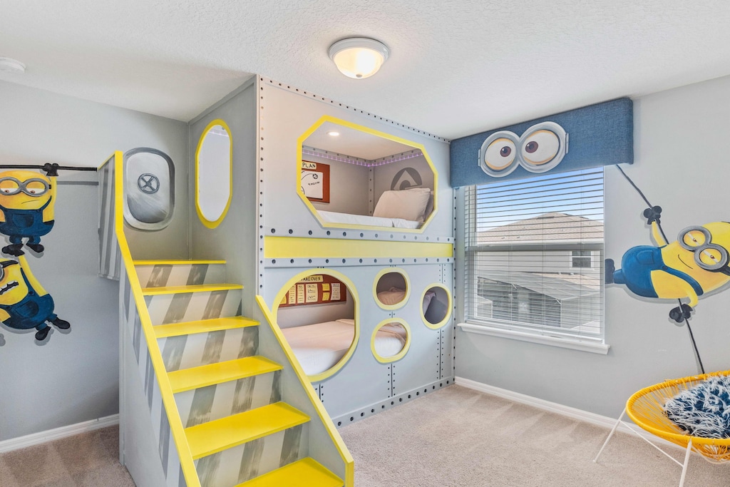 Welcome to the Minion-themed bedroom, where the whimsical world of minions comes to life. With two single beds adorned in playful motifs, it's a vibrant retreat where imagination runs wild and laughter fills the air.