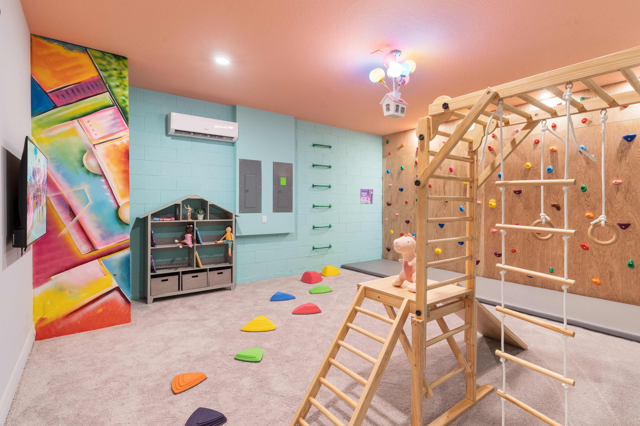 Discover our indoor playroom equipped with an exciting climbing wall, perfect for adventurous children and adults alike. Enjoy hours of active fun in a safe and engaging environment right at home.