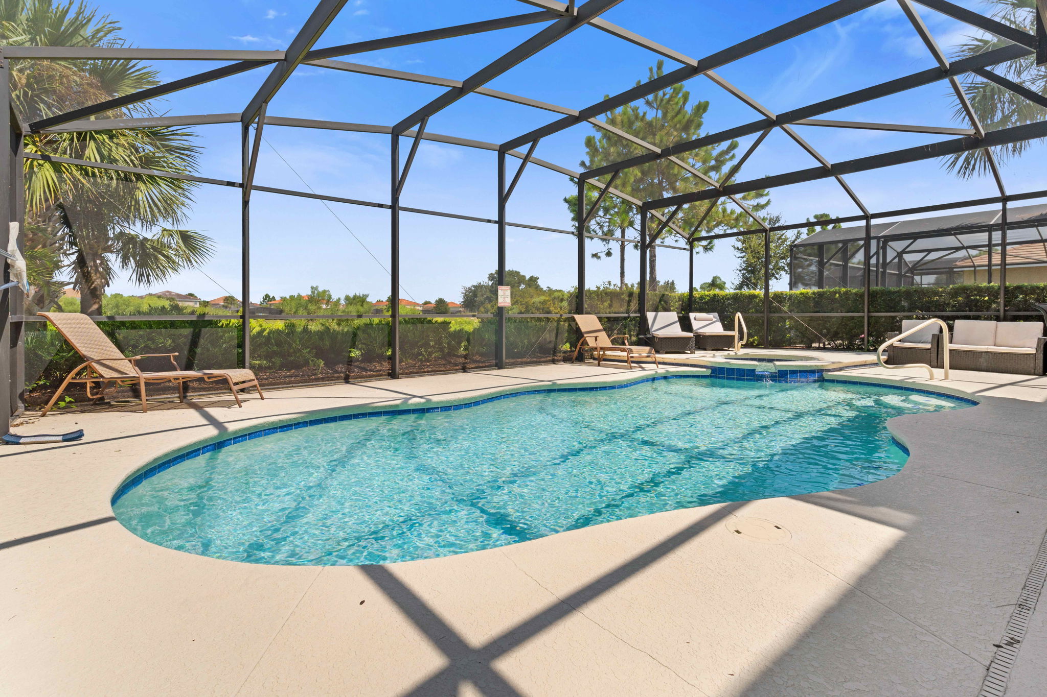 Stunning private pool area of the home in Davenport Florida - Embrace the beauty of outdoor swimming pool - A retreat that sets the stage for a memorable stay - Enjoy leisurely moments in inviting pool area