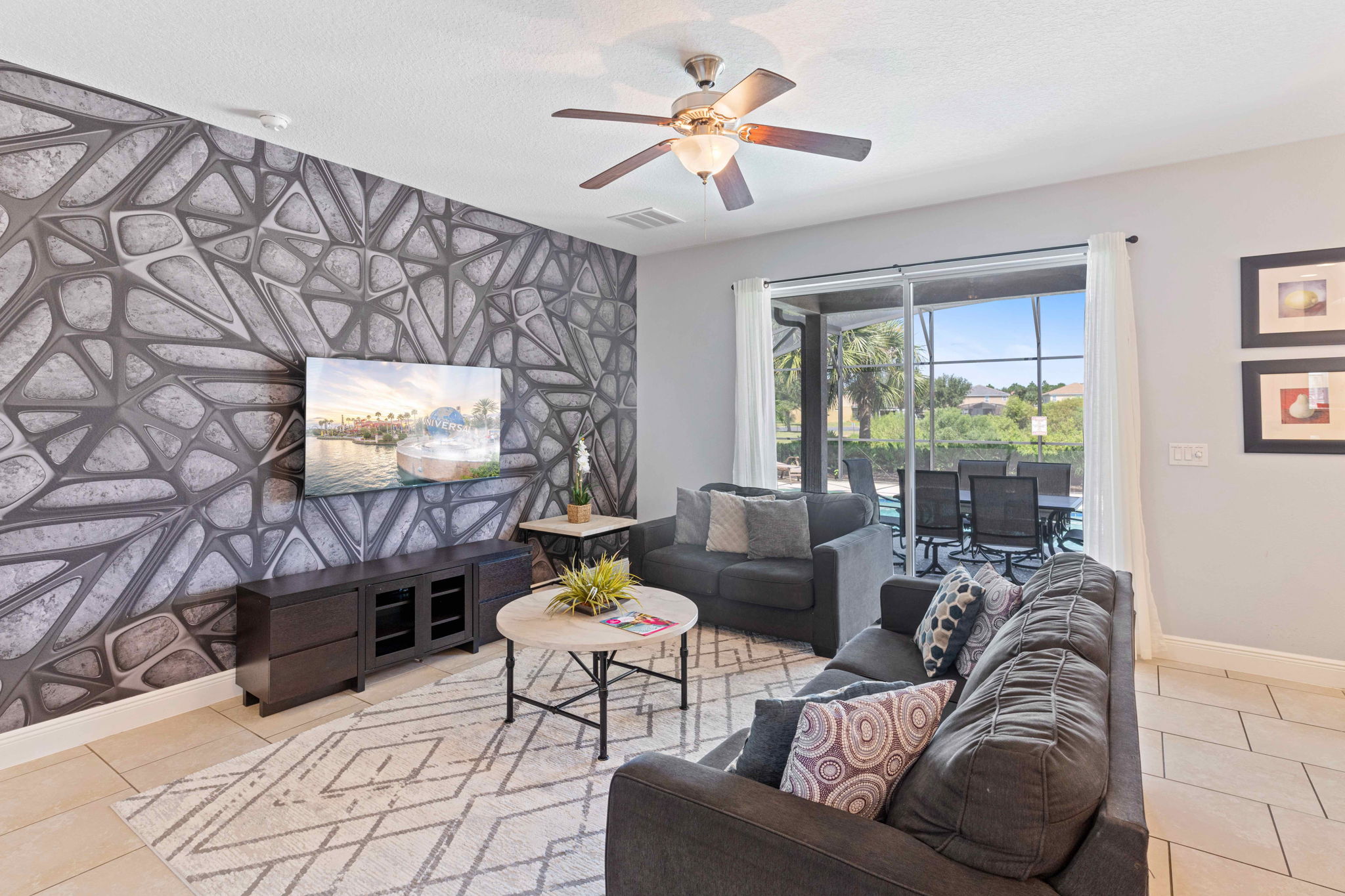 Stylish living area of the home in Davenport Florida - Unwind in the comfort, where modern aesthetics meet relaxation - Smart TV and Netflix - Relaxing seating with plush sofas