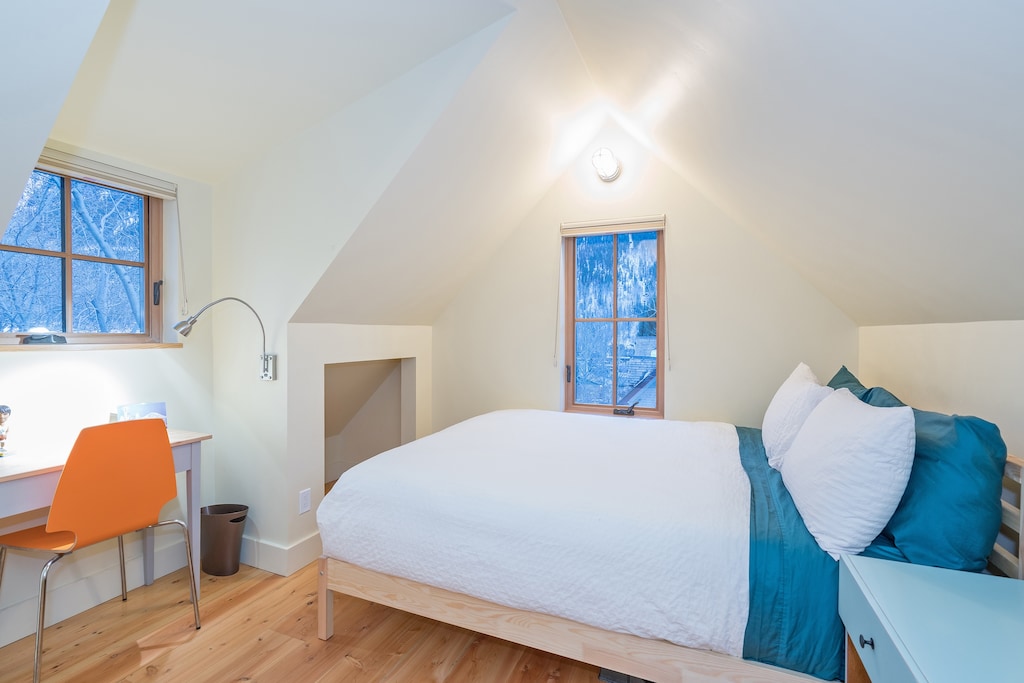 On the top floor, you'll also find a comfortable queen bedroom.