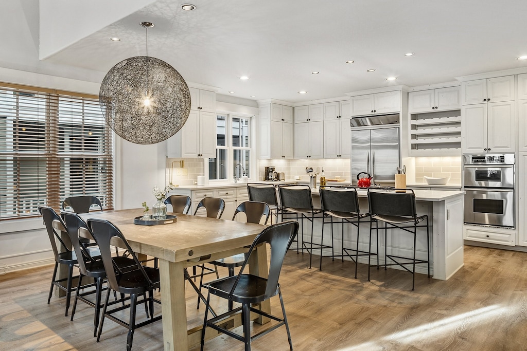 Open concept living area with gourmet kitchen, family dining, and spacious great room.