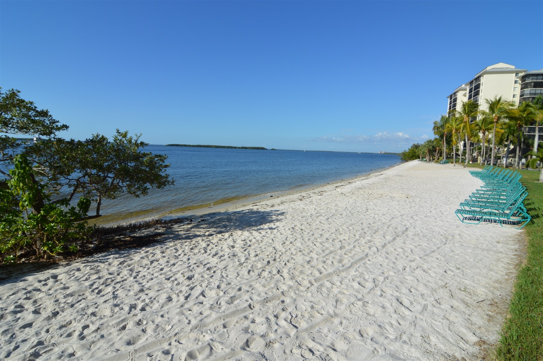 Private Beach with Complimentary Lounge Chairs