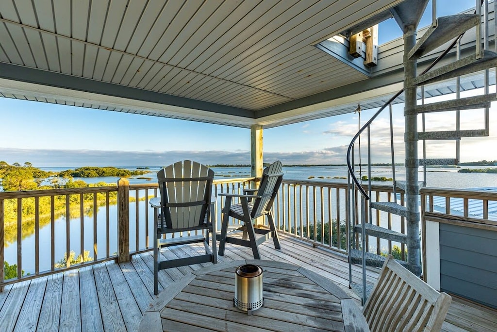 Deck view with spiral staircase to bird's eye view of the island