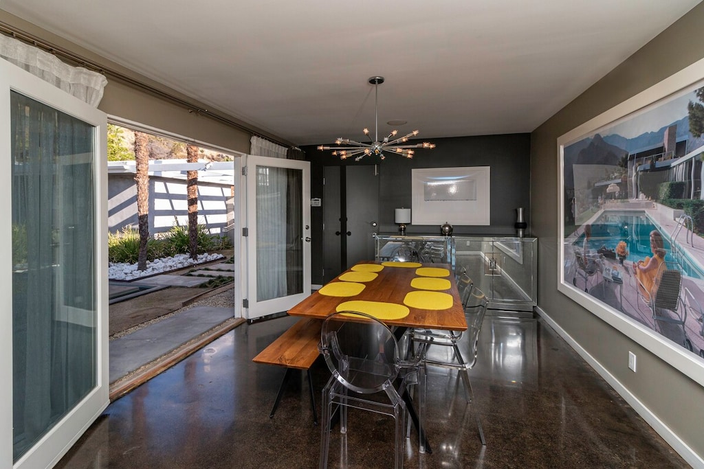 You can dine al fresco by opening the tall glass french doors.