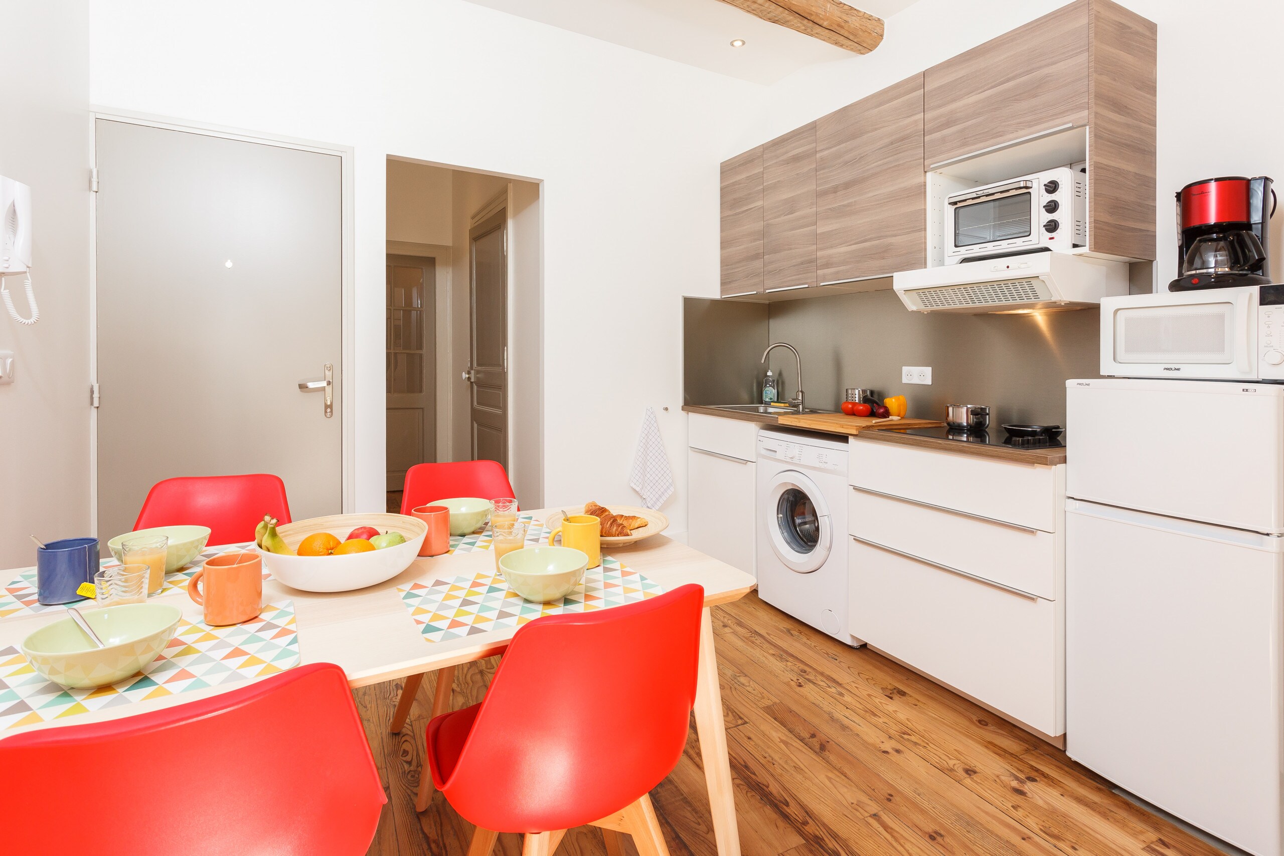 Fitted kitchen with a diner table