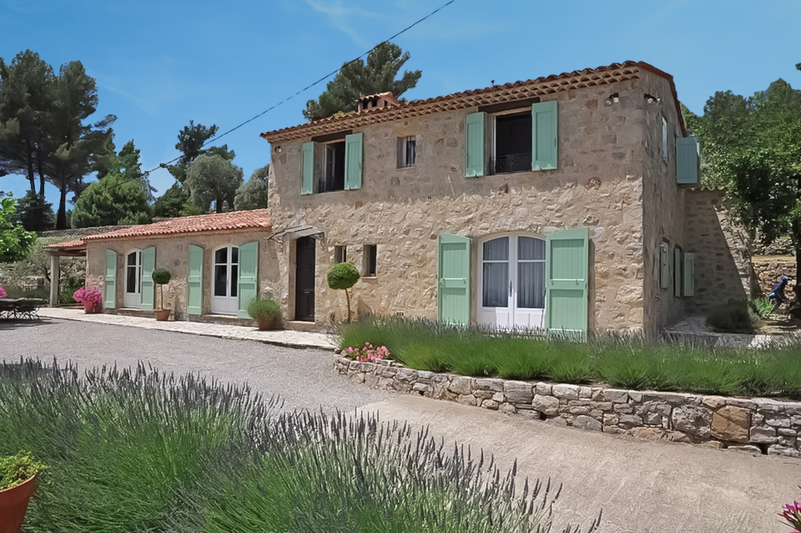 Discover Les Olivettes, a luxurious holiday villa with green shutters, fields of lavender, and a panoramic terrace. Located within walking distance of Fayence in Provence, this aerial view captures the entire villa, complete with a spacious pool and terraces