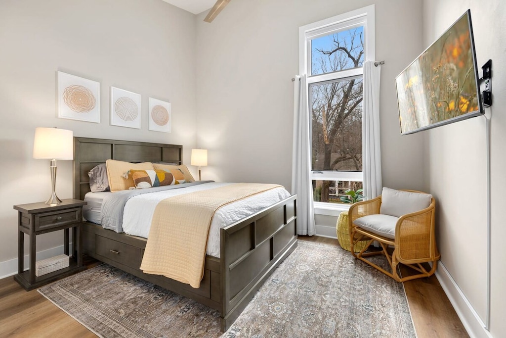 The second bedroom has a Queen bed, Smart TV, and a nearby bathroom.