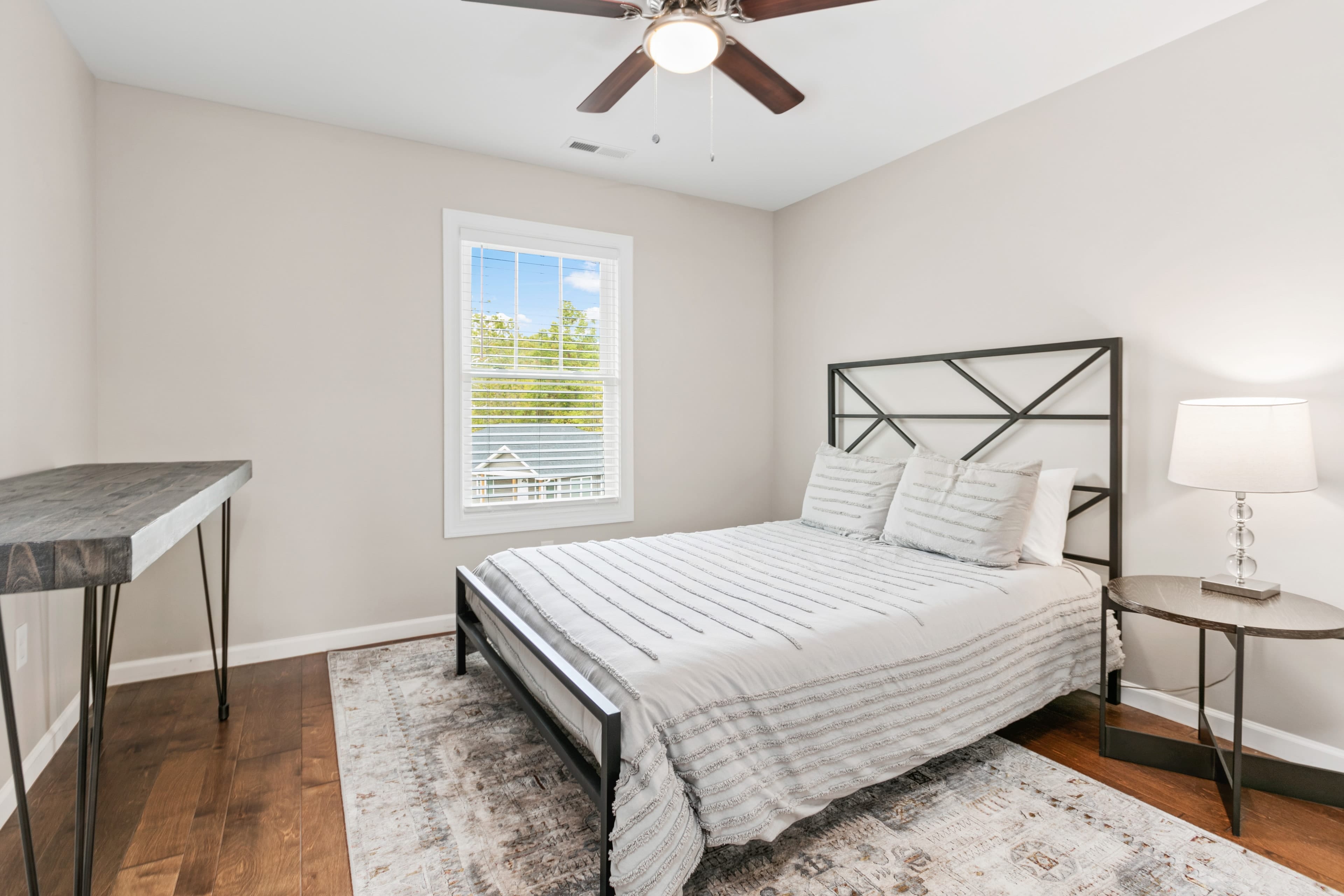 Bedroom 3 at White Pine features a queen bed.