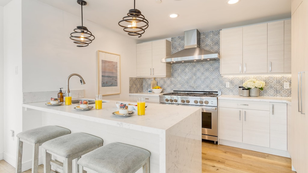 Each space features a kitchen.