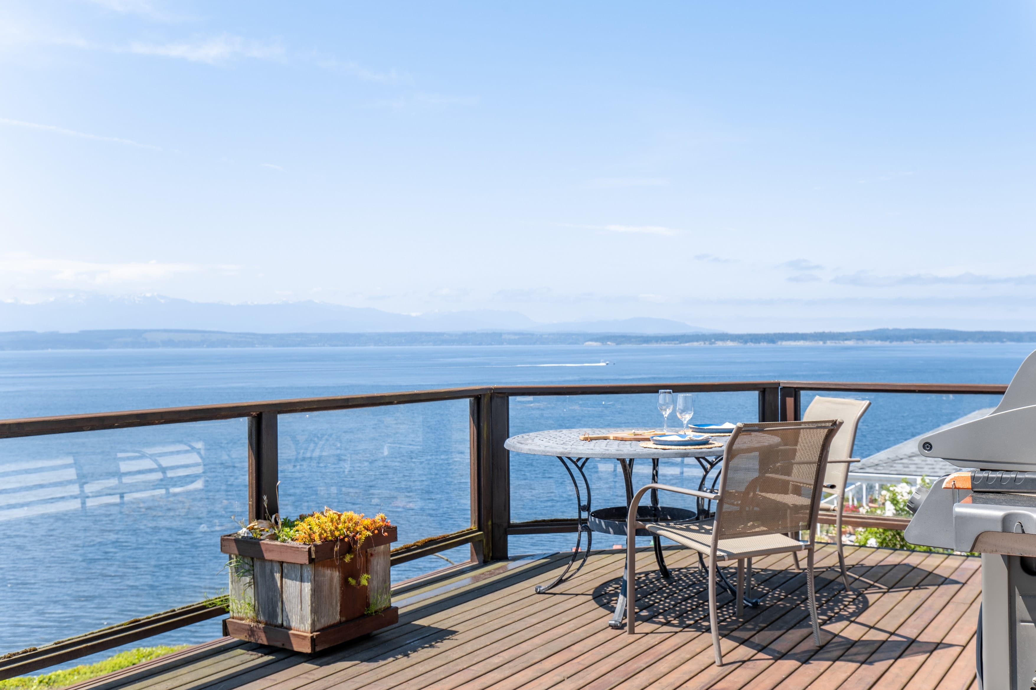 Sharing moments and ocean views at this outdoor table.