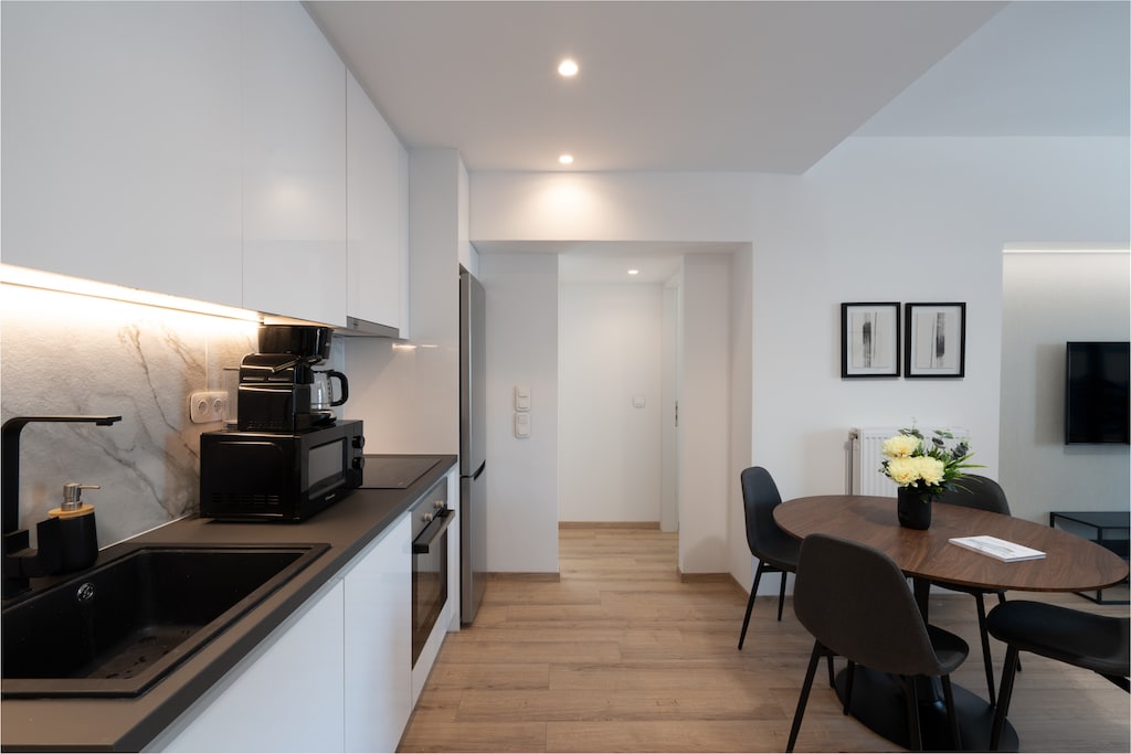 The kitchen is fully equipped and sure to inspire you to display your culinary genius.