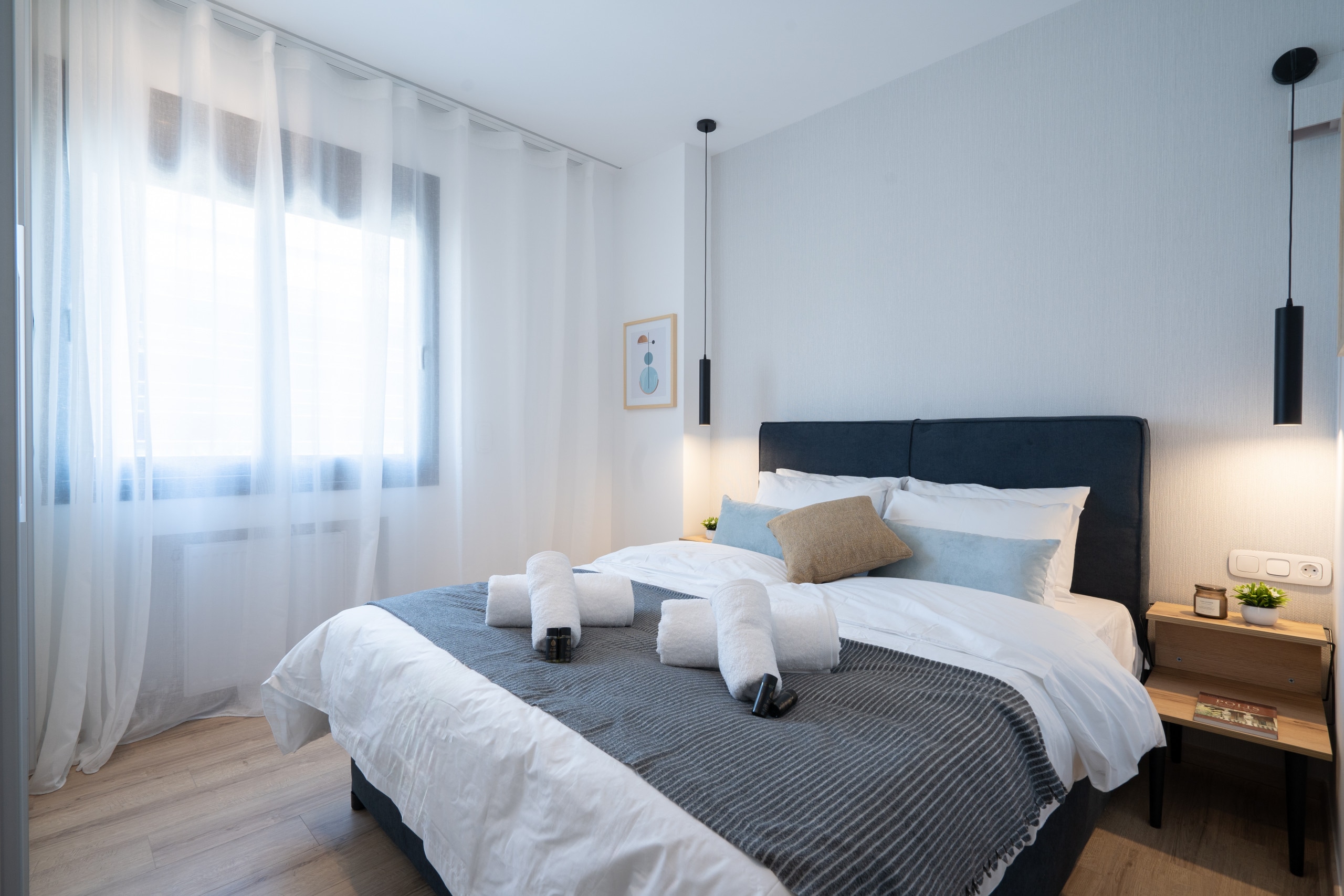 The bedroom has been thoughtfully equipped with top-quality mattresses and beddings, offering you a peaceful night's sleep in bustling Athens.