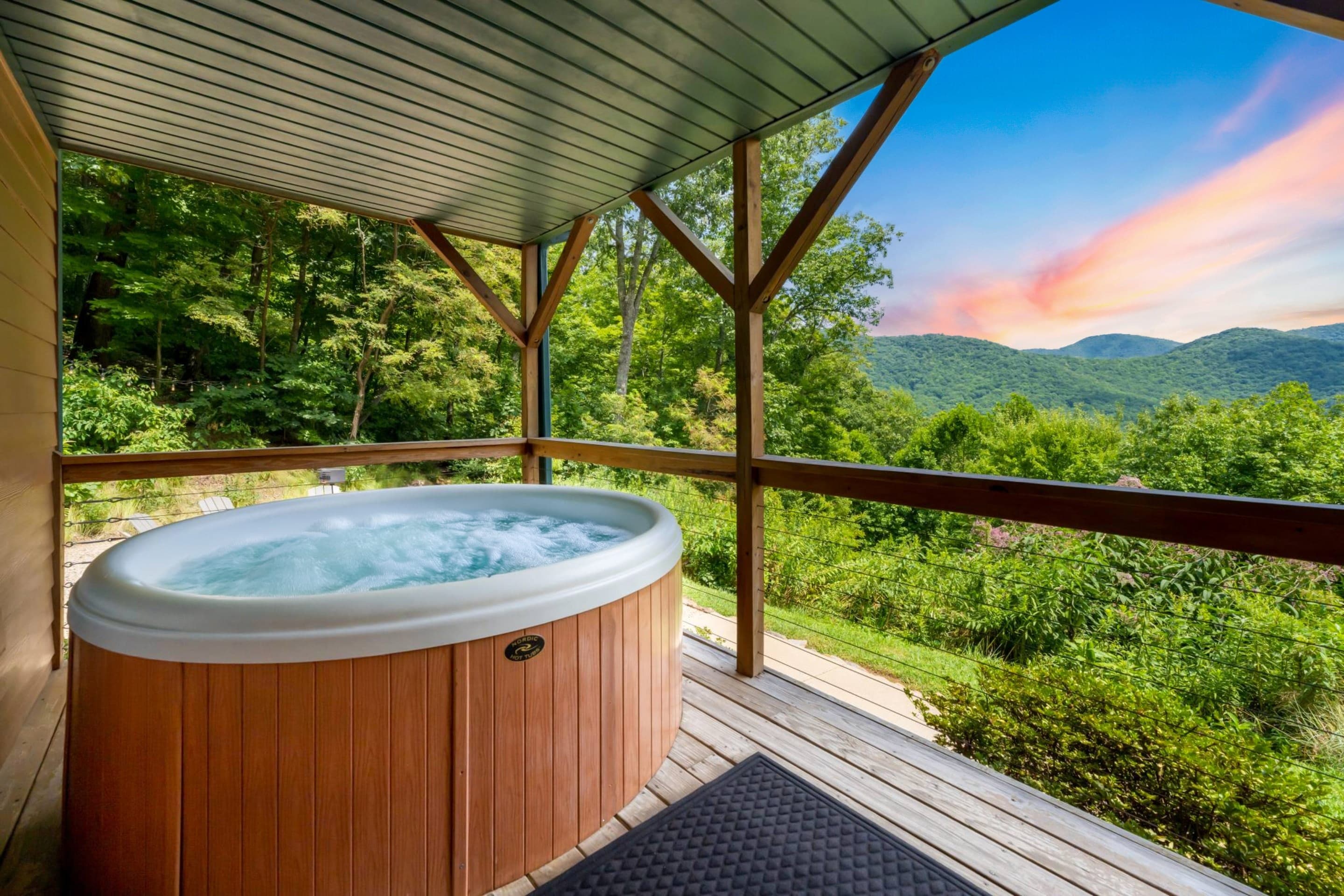 Indulge in some self-care and soak away your stress in our front porch hot tub.