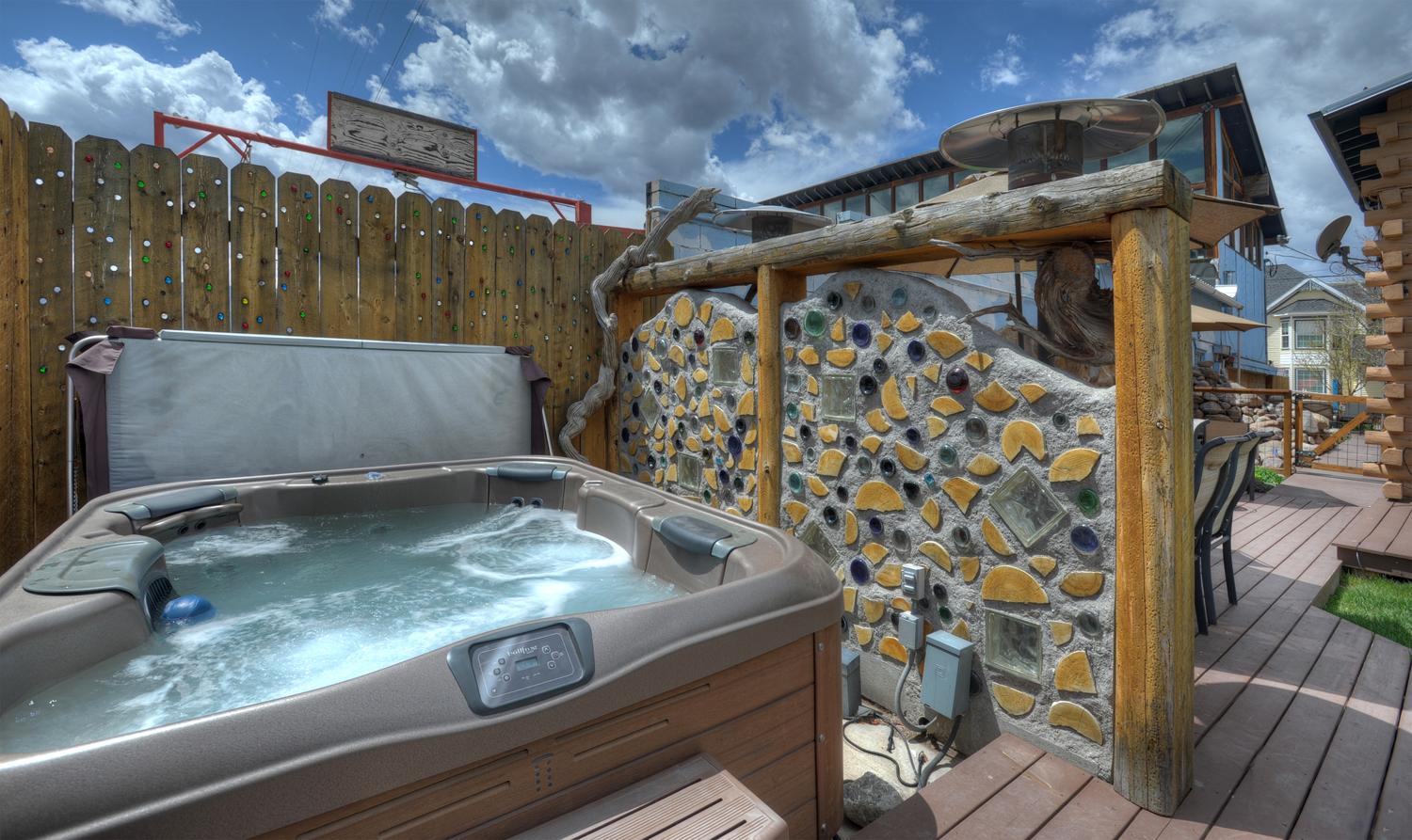 Private Hot Tub that backs up against the flume.