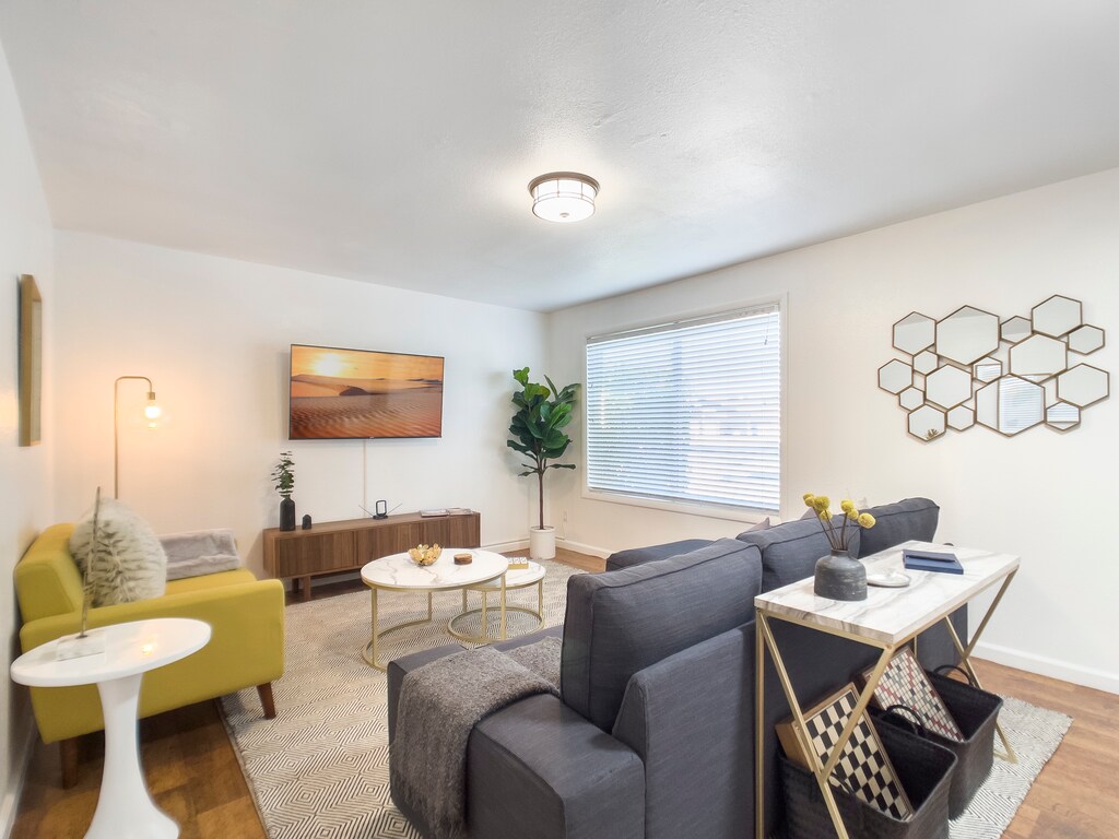 You'll find sofa seating and a flat screen Roku tv connected to streaming services. Over the air local channels available.