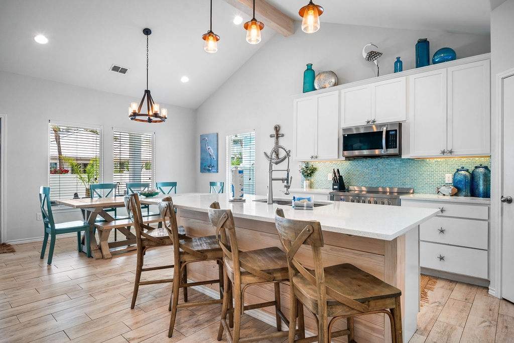 Gather 'round our spacious dining table with ample seating for all your friends and family to enjoy.