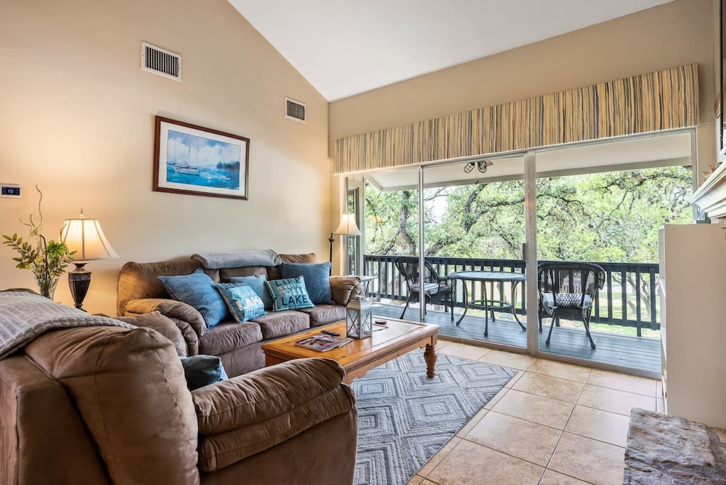 Cozy living room with direct walk out to the private balcony overlooking the pool.