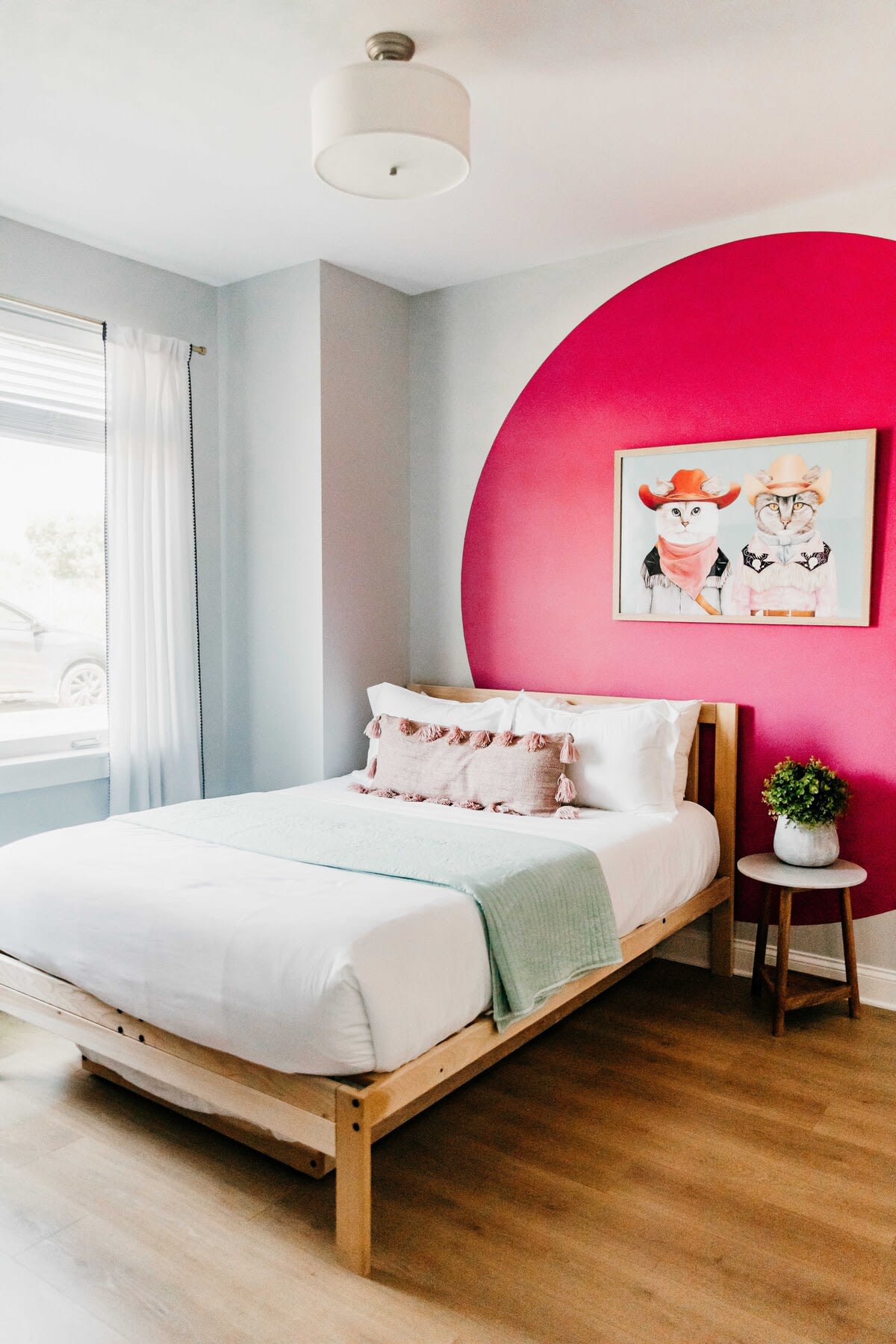 Fun and fresh modern bedroom with a queen bed and twin trundle