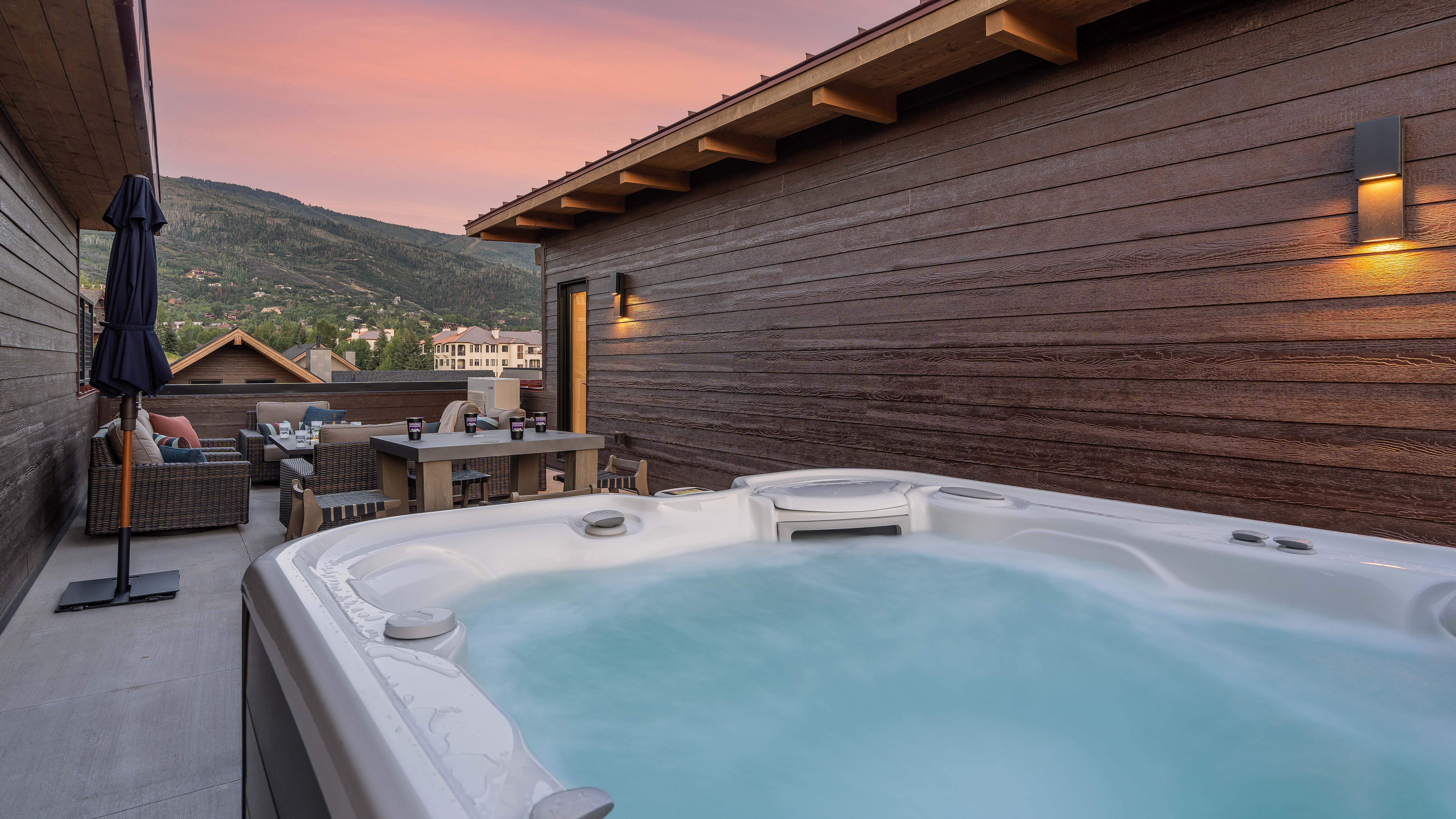 Rooftop patio private hot tub with views of Steamboat Ski Resort