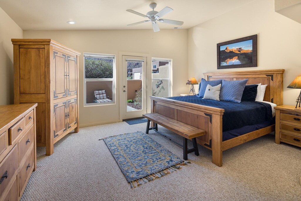 Peaceful nights and restful mornings start right here in the King Bedroom located on the main level with door opening to the patio
