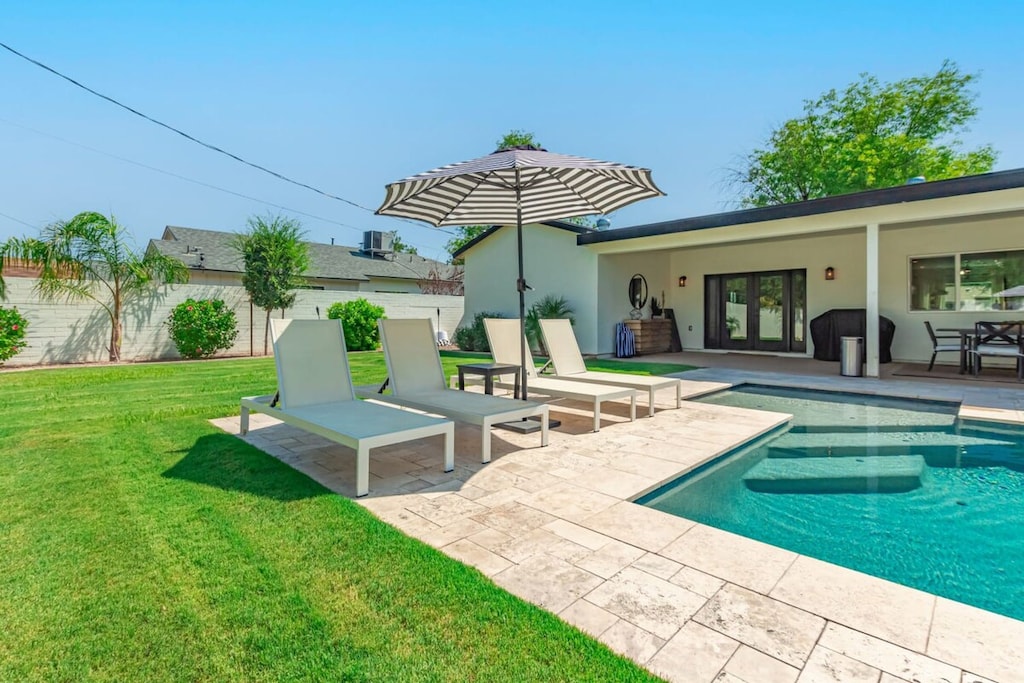 Soak up the Sun Pool Side or in the Shade of the Covered Patio
