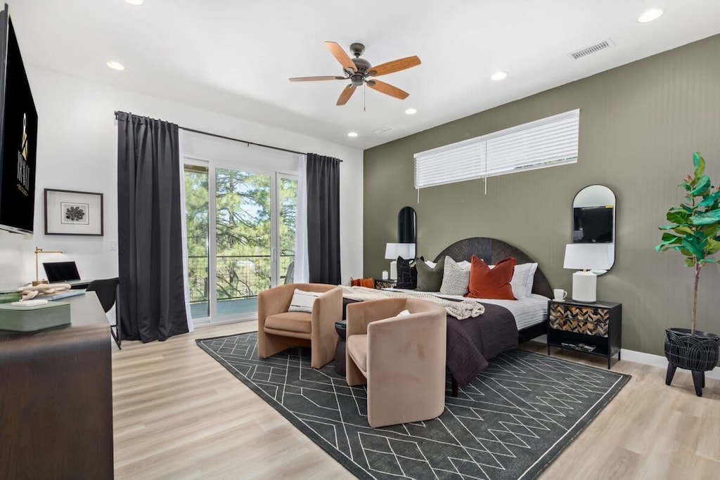 KIng bed, desk/workspace, deck access and en-suite bathroom